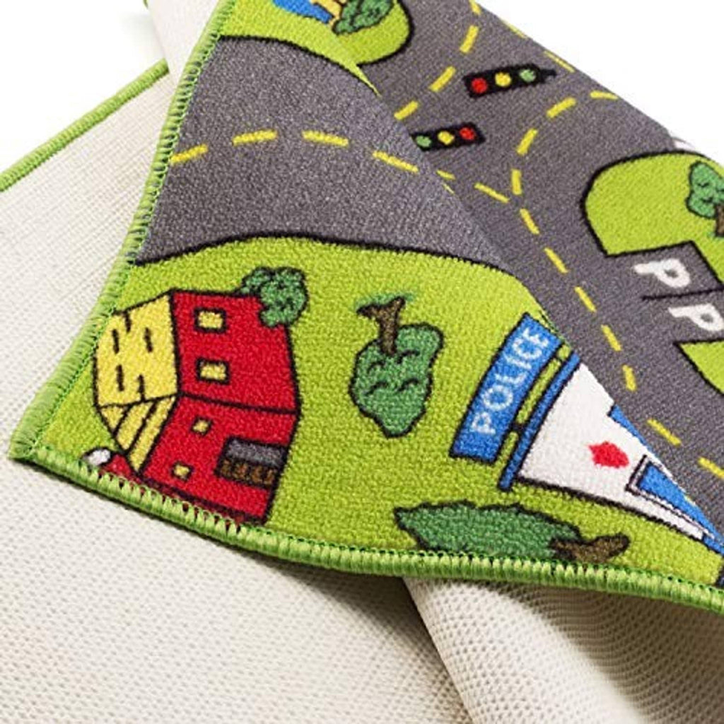 Kids city playmat rug corner detail with stitched border and non-slip textured backing