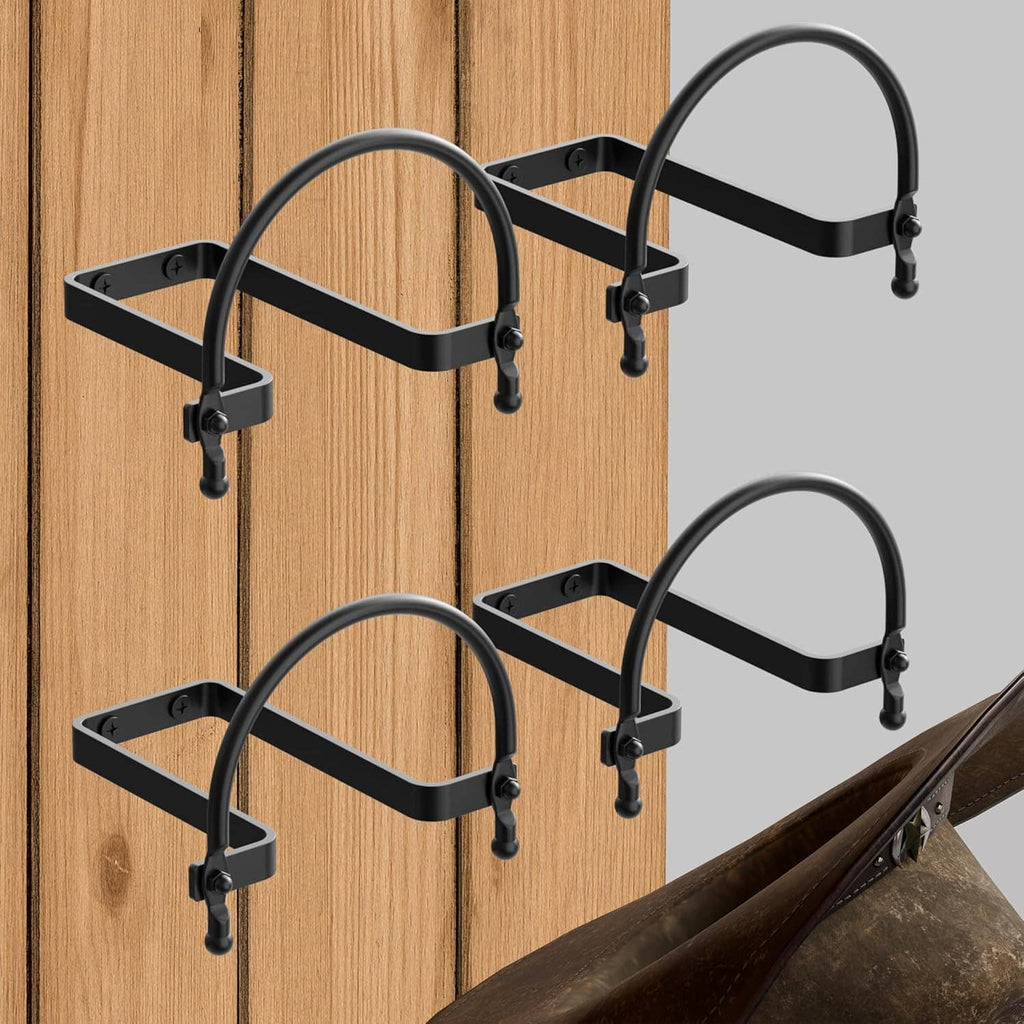 Wall-mounted hat rack set with four black hooks displaying a folded cowboy hat