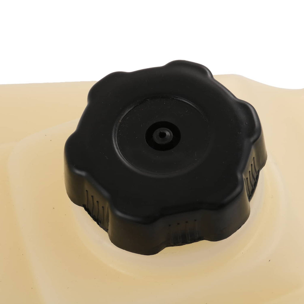 ATV gas cap on fuel tank, black plastic with central vent opening