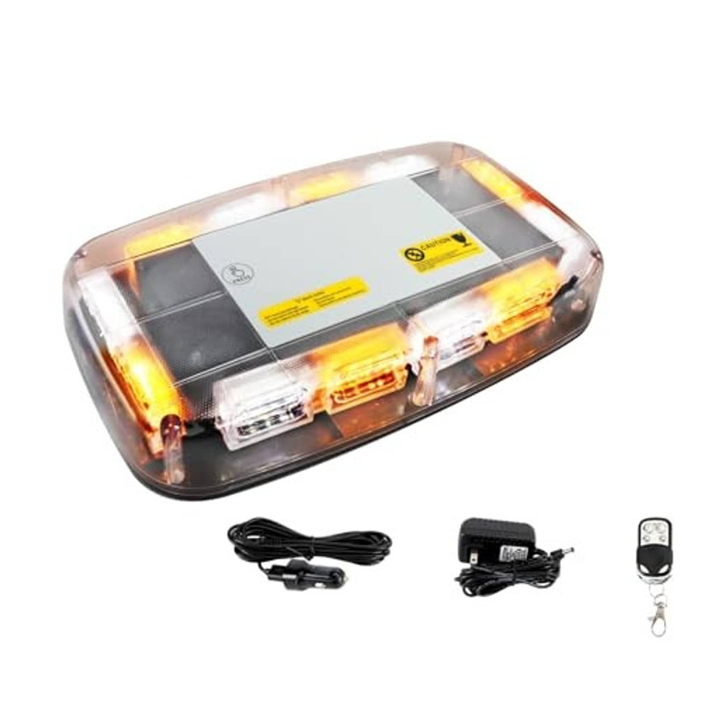 Compact roof top strobe light with clear amber lens and white LED flashes