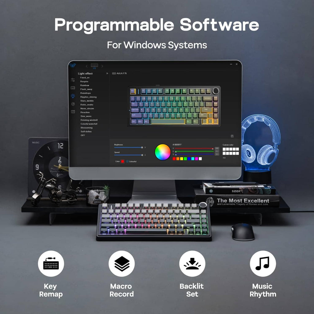 Mechanical keyboard with RGB backlit keys and a computer screen showing color controls