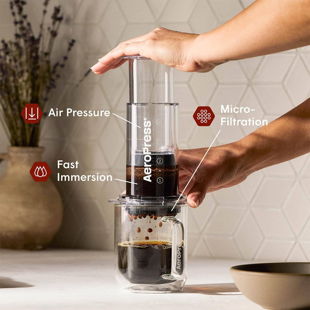 AeroPress filter disc fitted in brewing chamber during coffee making