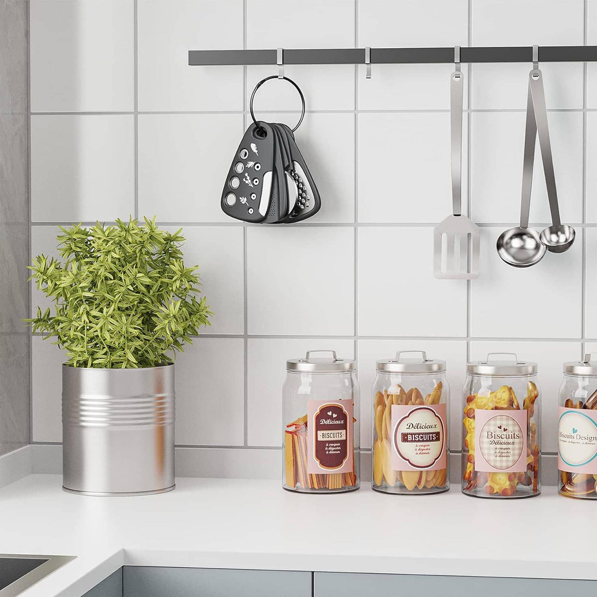Space-saving kitchen gadget set with black grater and bottle opener, hanging on hooks