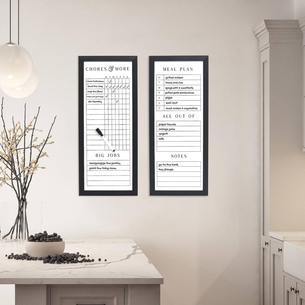 Two black framed family planner dry-erase boards mounted on wall, meal plan and chores
