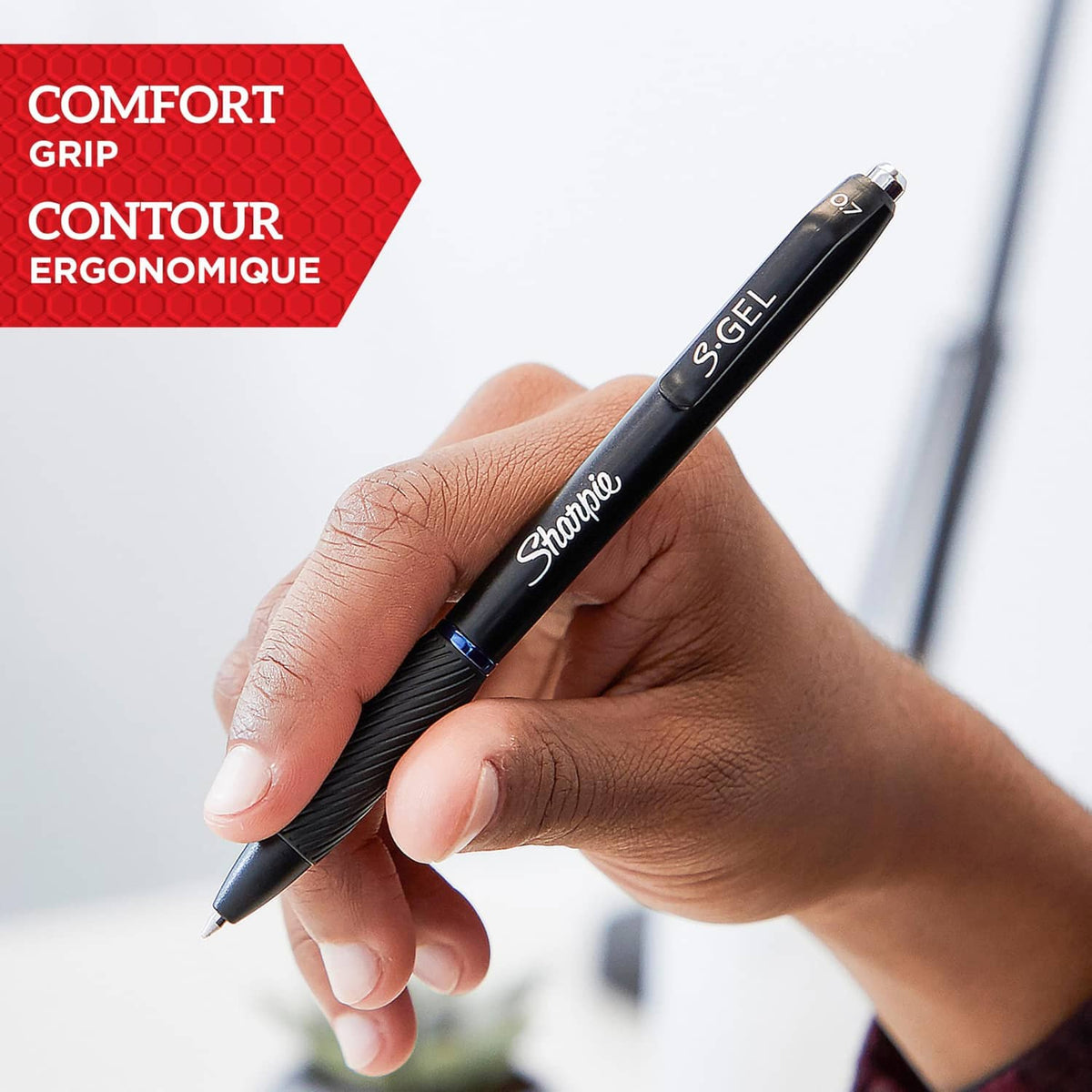 Sharpie S-Gel gel pen with contoured comfort grip, held in a hand