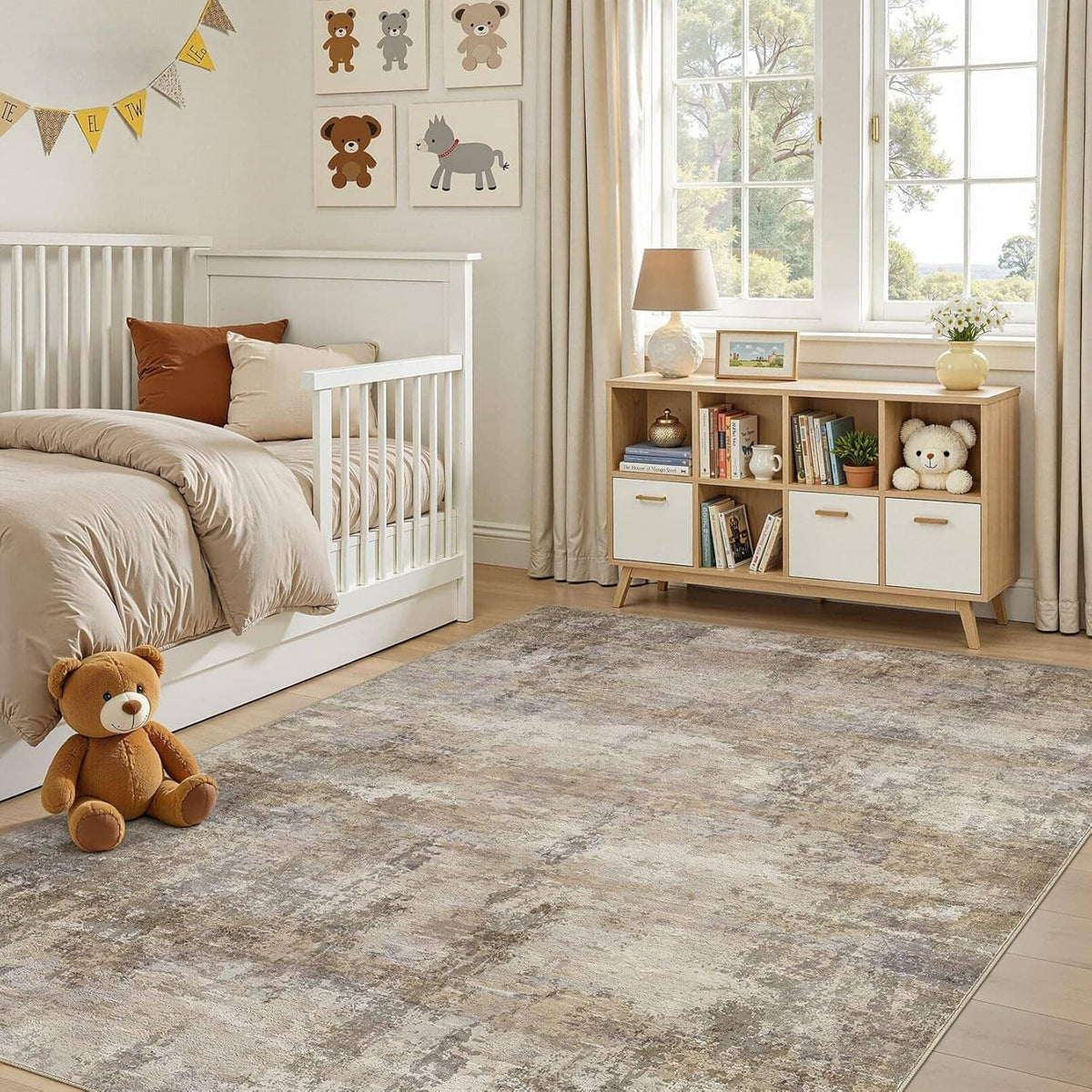 Large distressed beige and gray area rug with bordered edge on floor