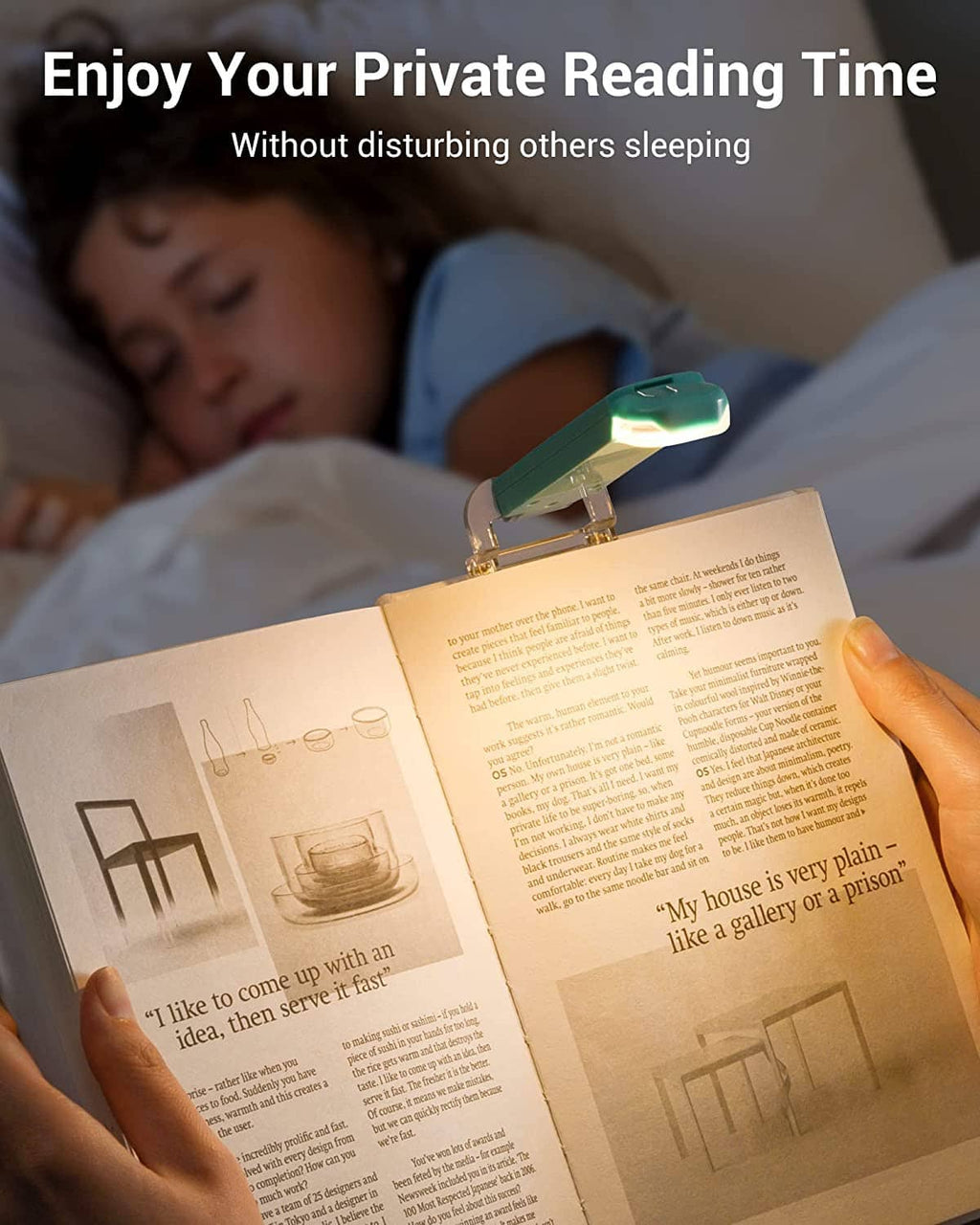 Turquoise LED book light clipped to open book in bed for night reading.