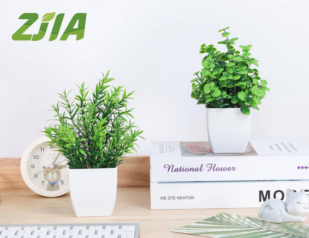 ZJIA 2-pack artificial plants: two small green plants in white pots.