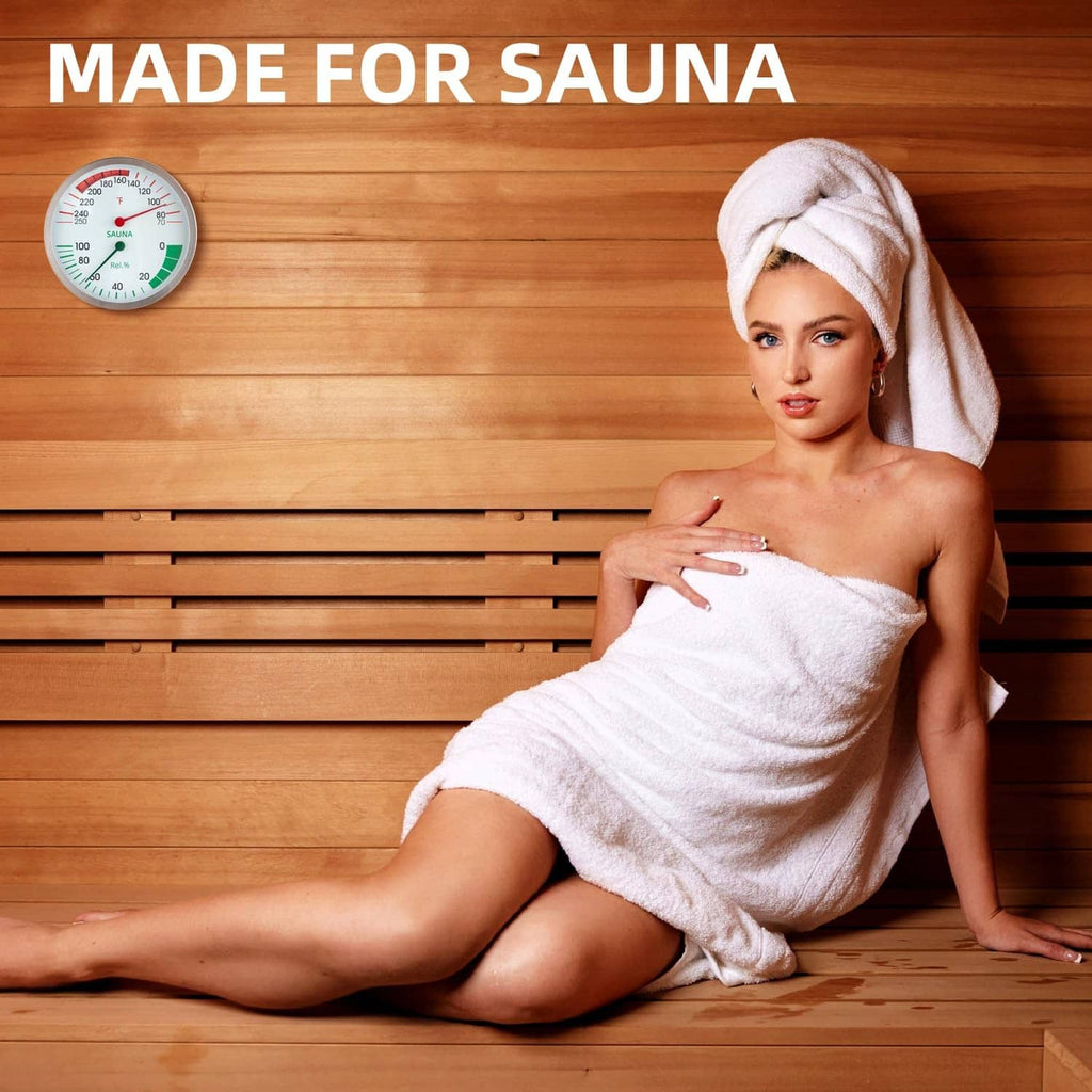 Wall-mounted round silver sauna thermometer hygrometer dial with red temperature needle and green humidity needle
