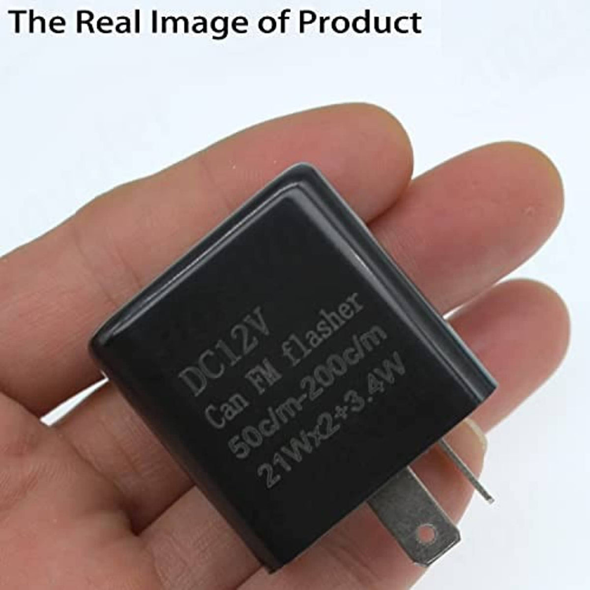 DC12V flasher relay, black box with two metal pins, close-up in hand