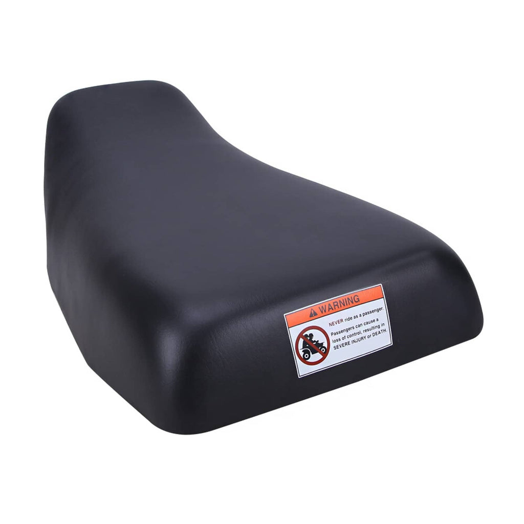 Black ATV seat with warning label patch on side, padded curved cushion