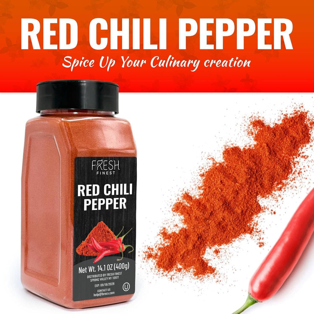 Red chili pepper seasoning jar with mound of orange-red powder and chili