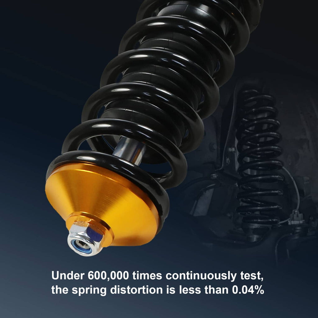 Close-up of coilover spring with gold top mount and black shock body