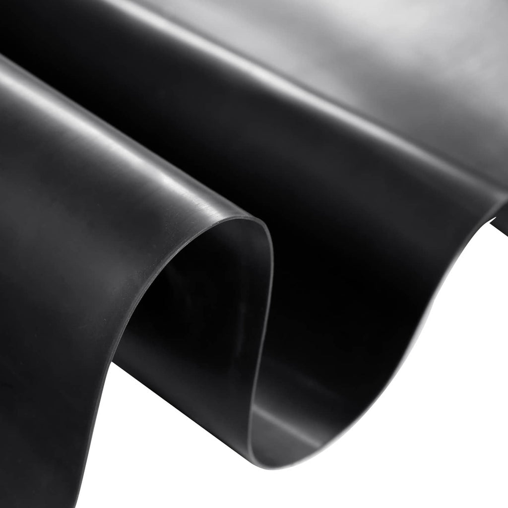 Close-up of black pond liner material with curved corner and smooth finish