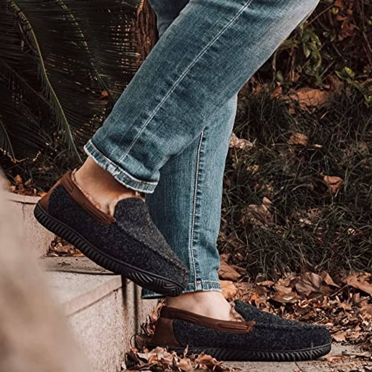 Men's moc slipper, dark charcoal knit with brown heel strap and tan shearling lining