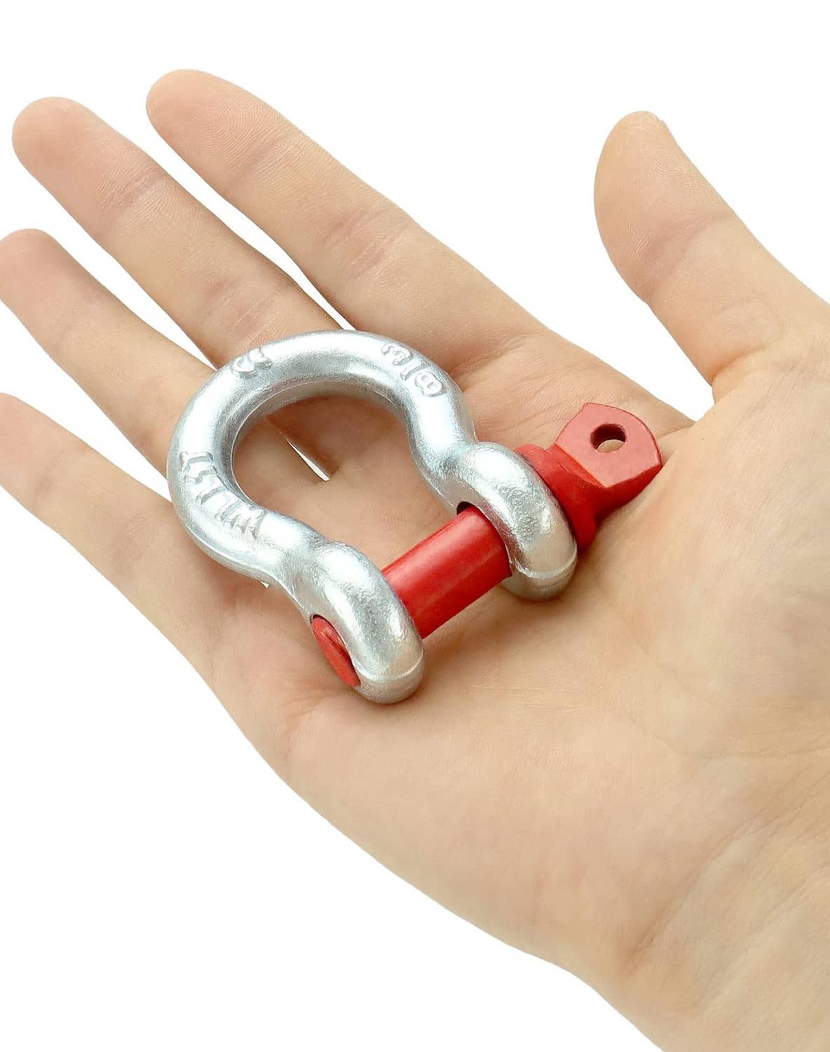 Galvanized screw pin D-ring shackle with red pin held in a hand
