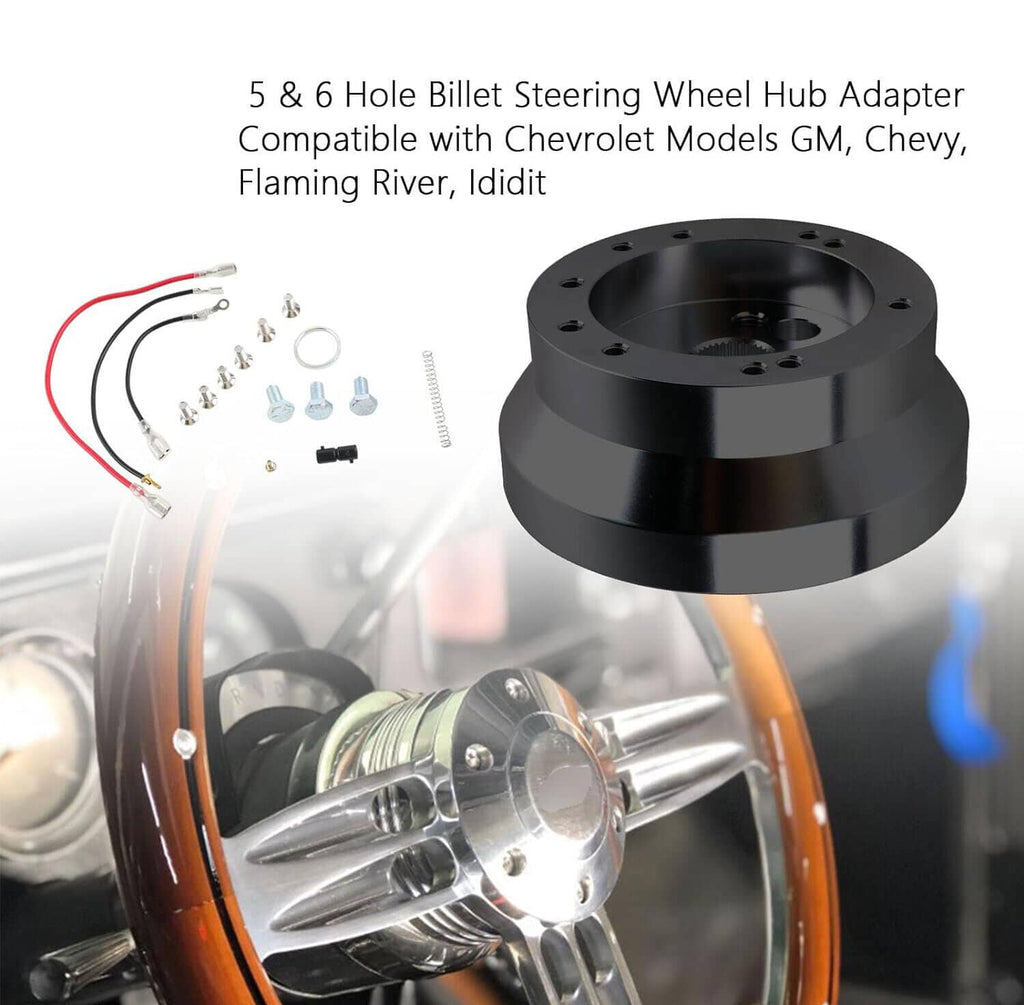 Black steering wheel hub adapter with hardware and wiring harness components