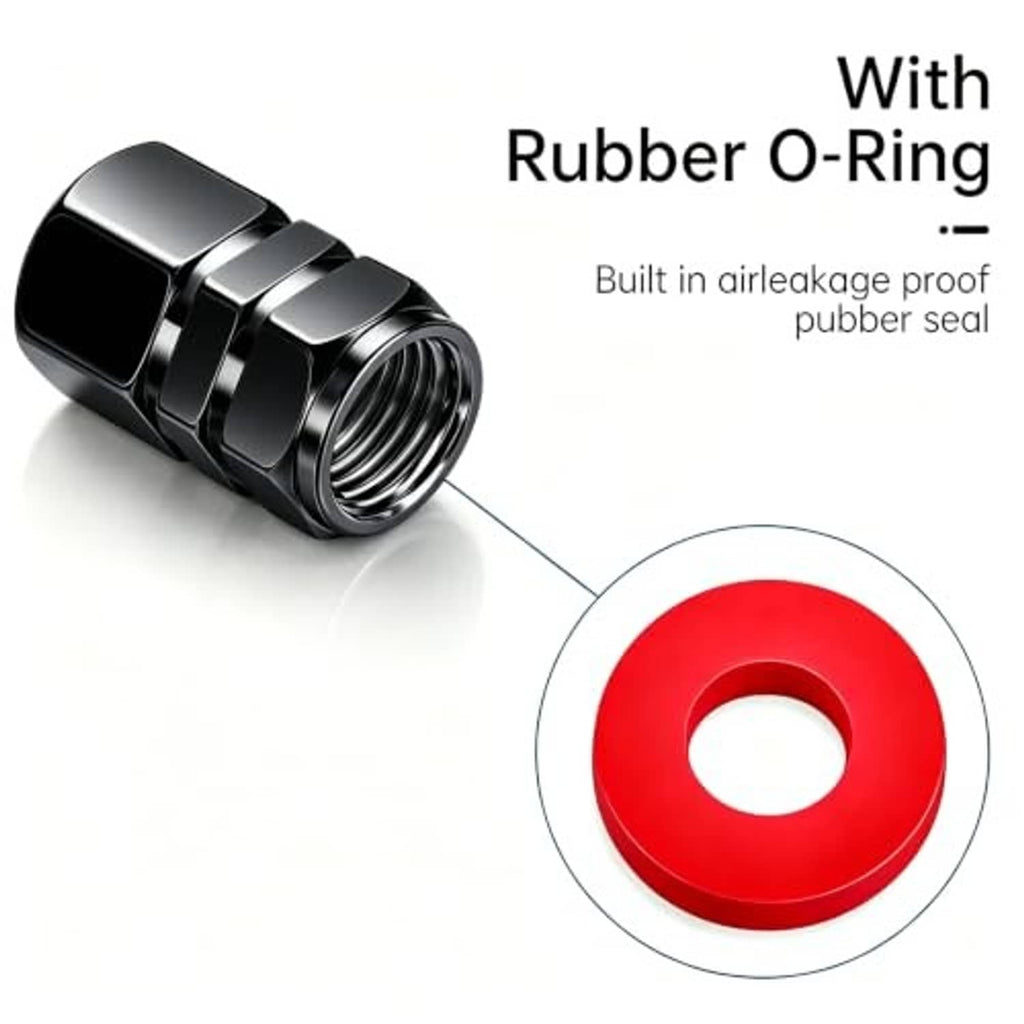 Black metal tire valve stem cap with red rubber O-ring seal, close-up