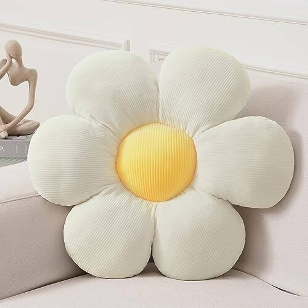 White flower shaped throw pillow with yellow center, rounded petals