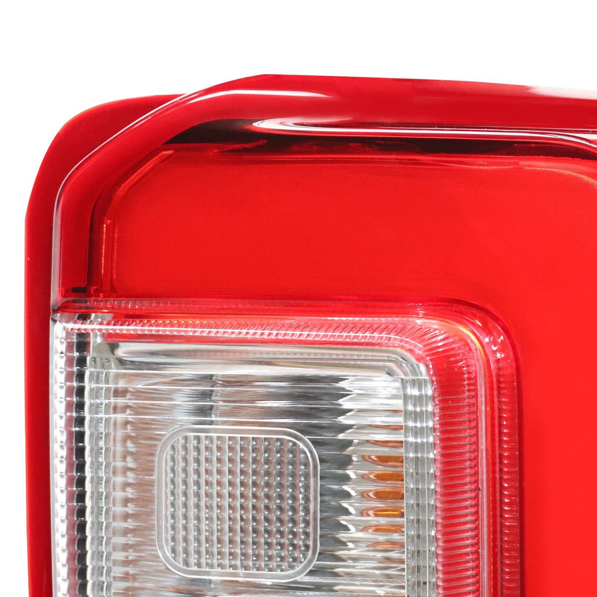 Right rear LED tail light lens detail with clear window and red bezel