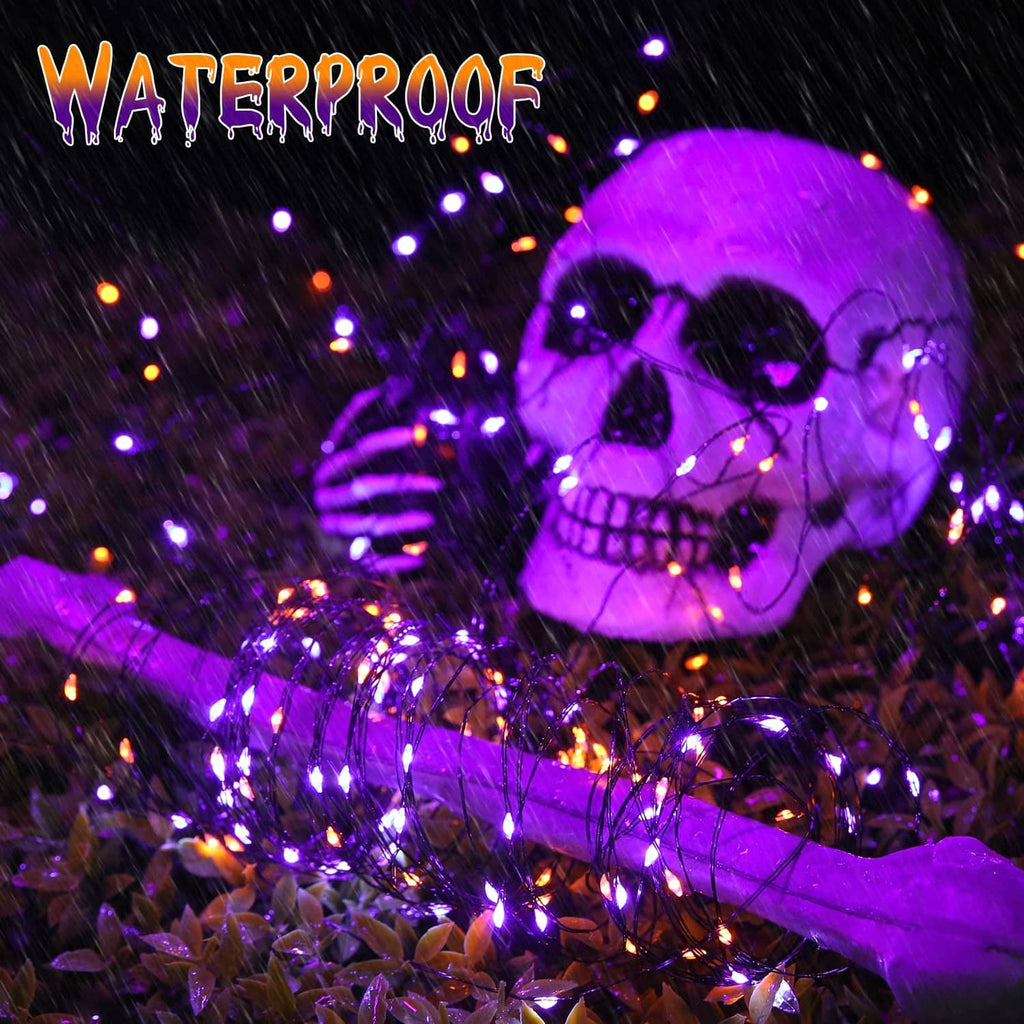 Purple LED skull-themed solar string lights wrapped around a glowing skull decoration