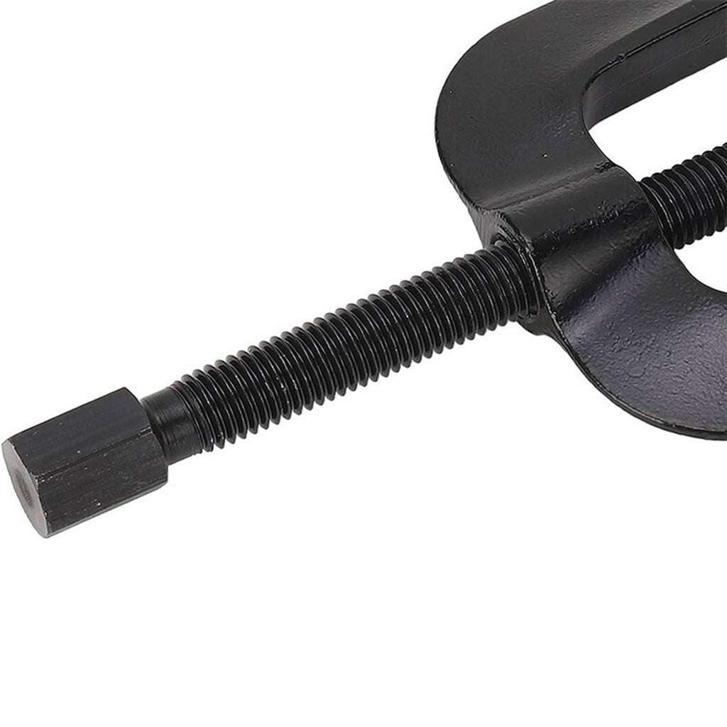 Close-up of black bracket puller with textured U handle, threaded rod, and end nut