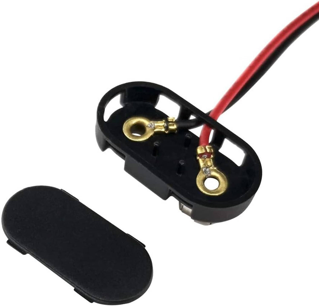 Close-up of T-type 9V battery connector socket with gold contacts and red/black wires