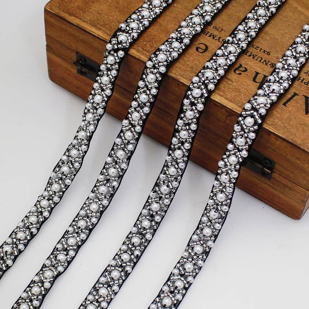 Pearl beaded lace trim ribbon with multiple parallel rows in black and silver