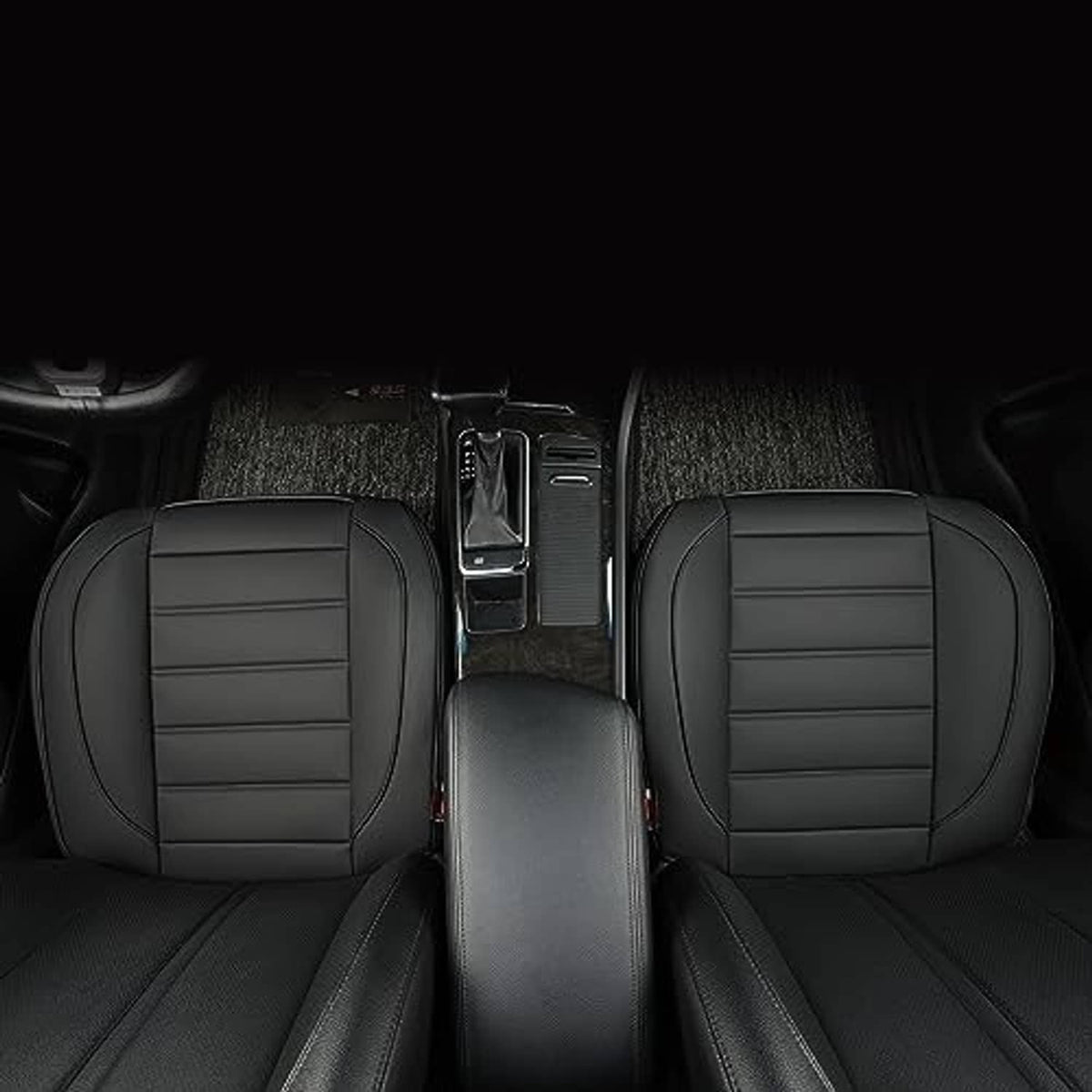 Black front seat bottom covers for both seats with stitched panel pattern and contoured shape