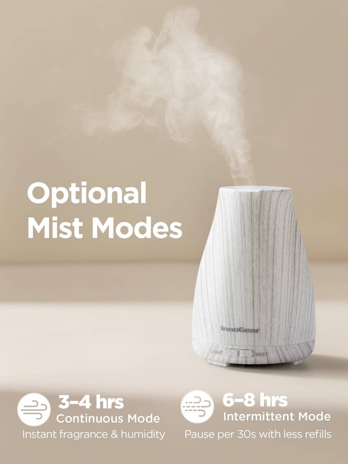 InnoGear essential oil diffuser releasing mist, white-gray textured housing
