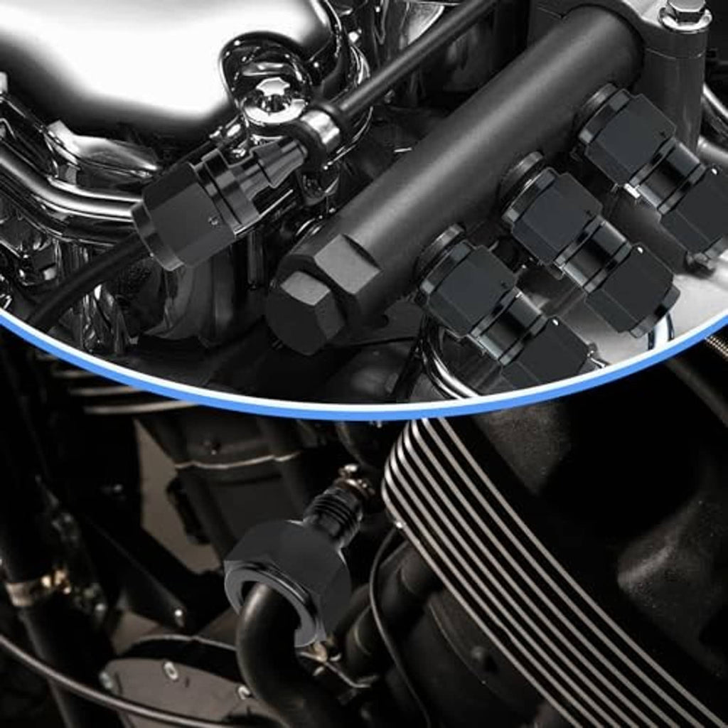 Black hose reducer fitting installed in engine area, hex body with threaded ends.