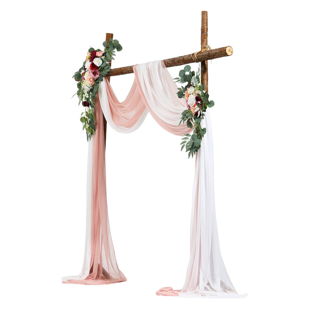 Artificial wedding arch kit with pink and white sheer drapes and two floral decorations