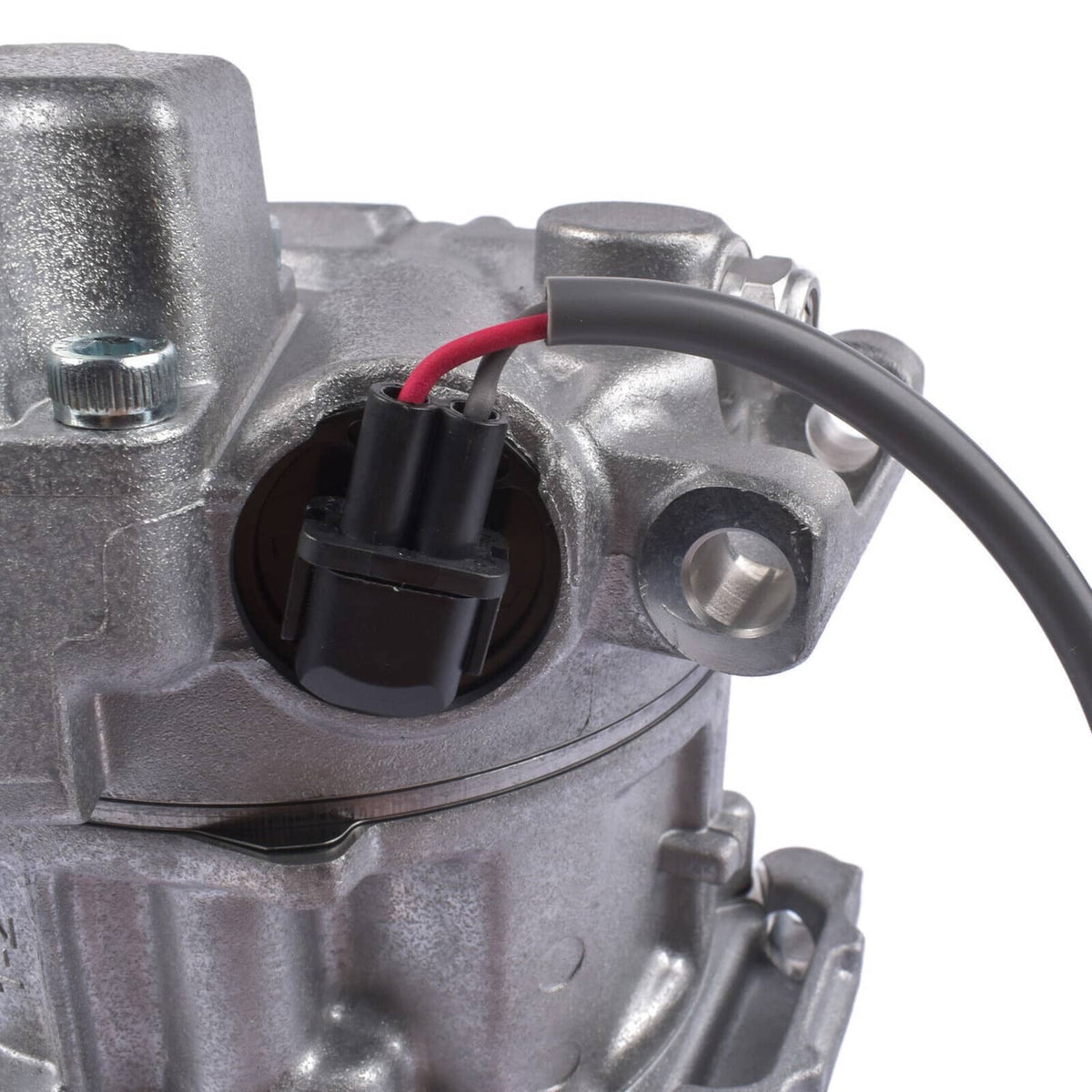 A/C compressor sensor connector detail on silver housing with red and black wire leads