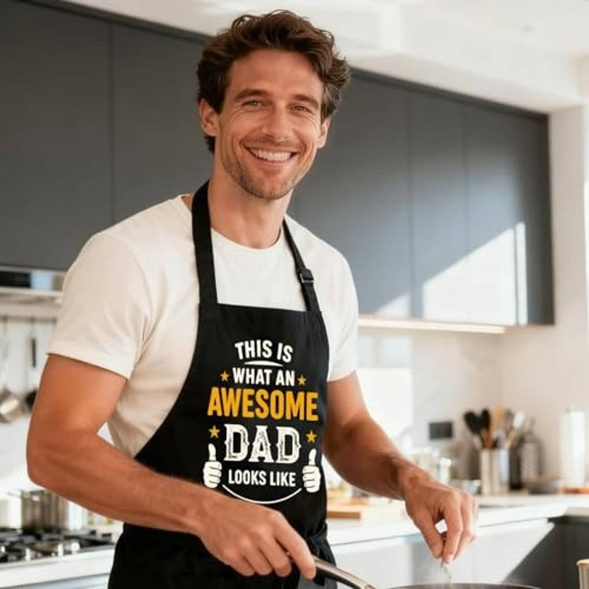 Black grill apron with “Awesome Dad” graphic and adjustable neck strap