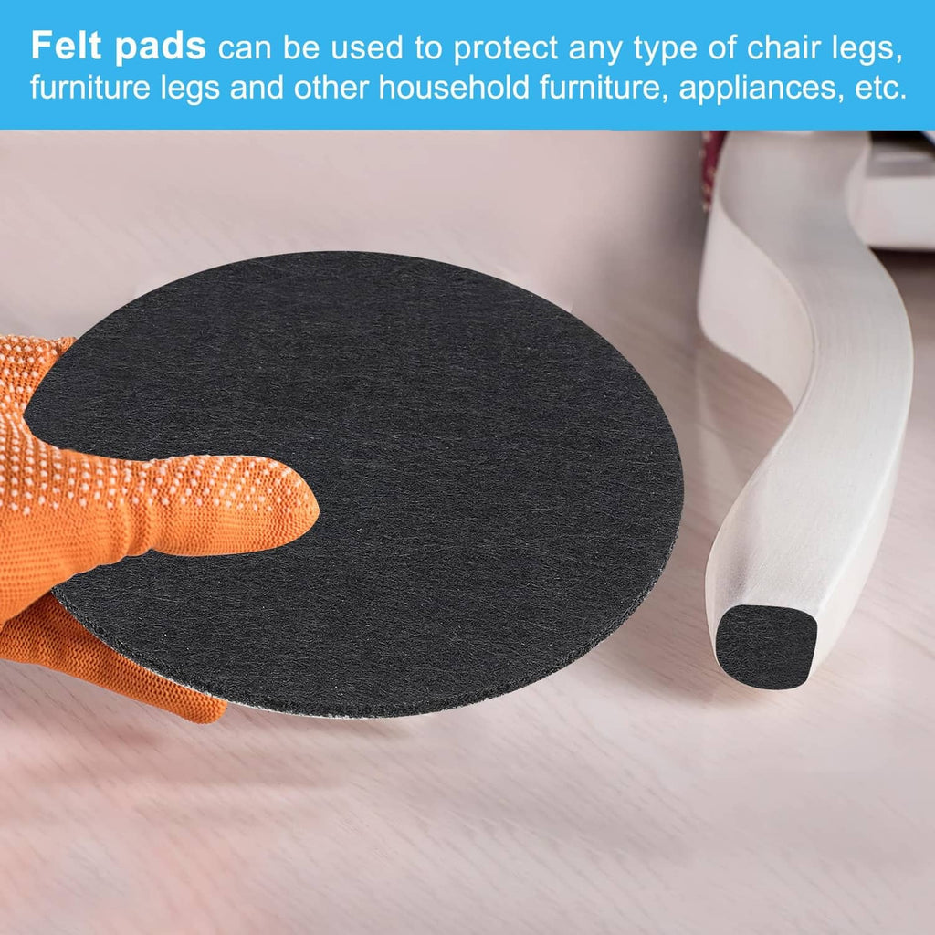 Black felt furniture protector pad under a chair leg to reduce wear