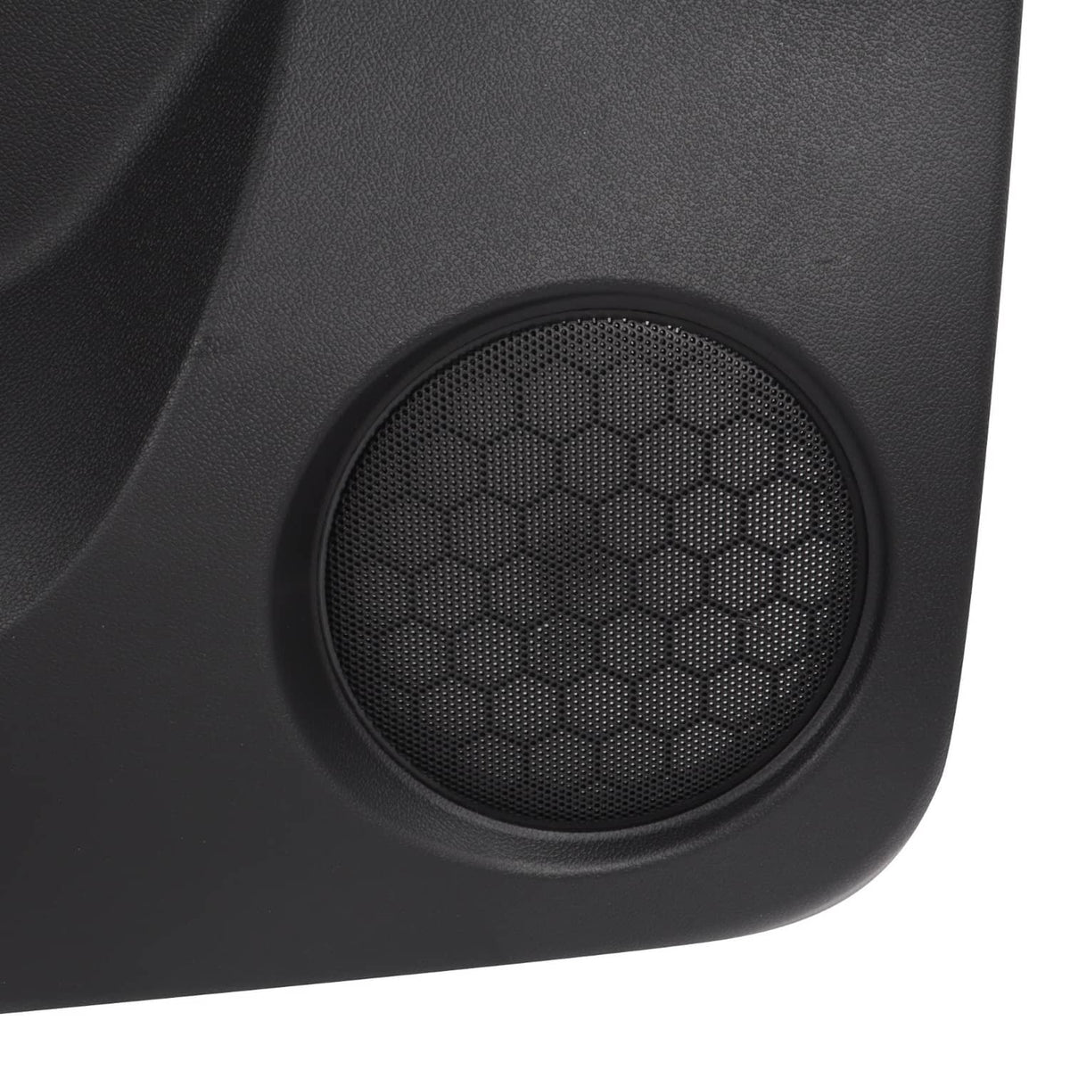 Circular door speaker grille in black mesh trim panel insert.