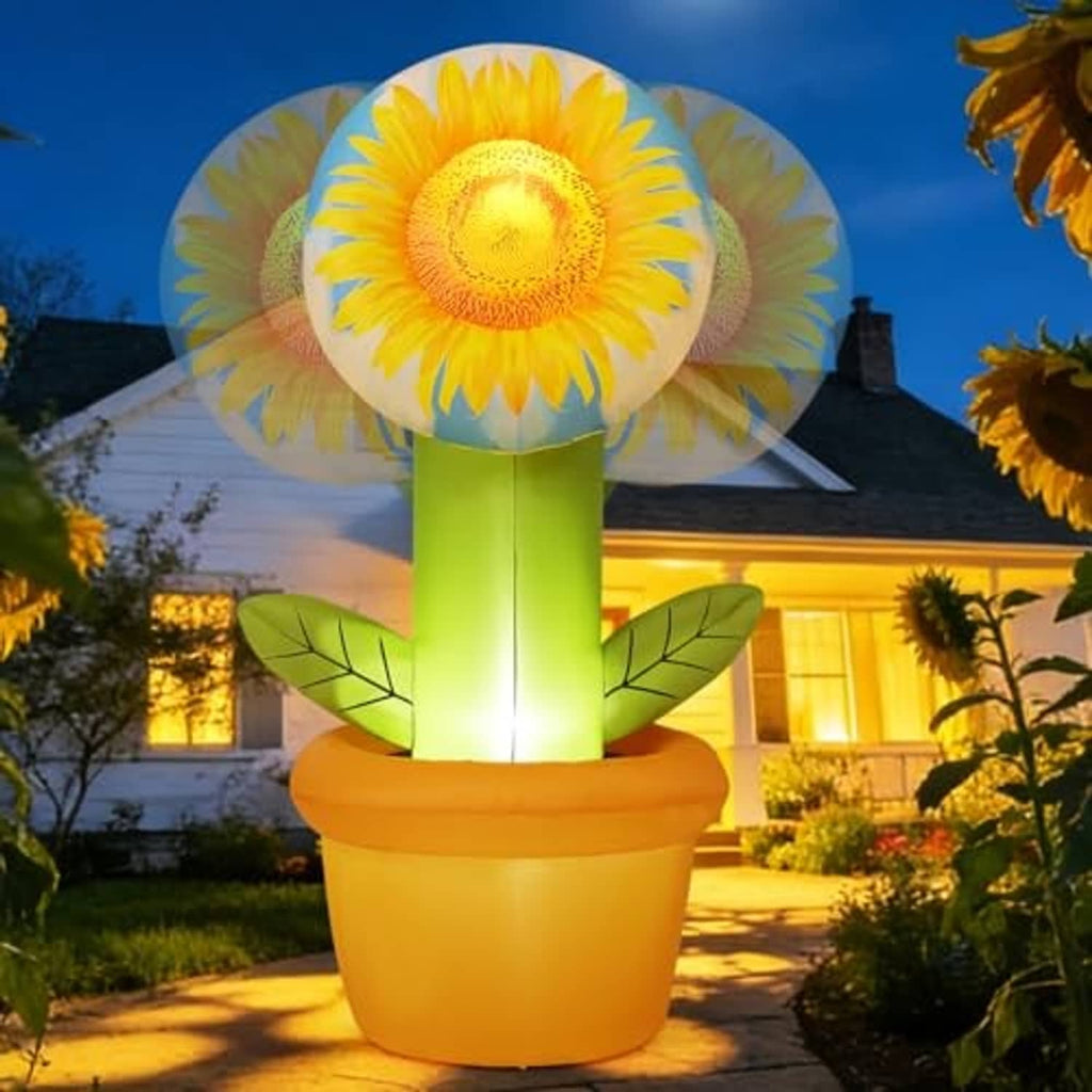 Glowing inflatable sunflower outdoor decoration with yellow flower head, green stem, orange pot