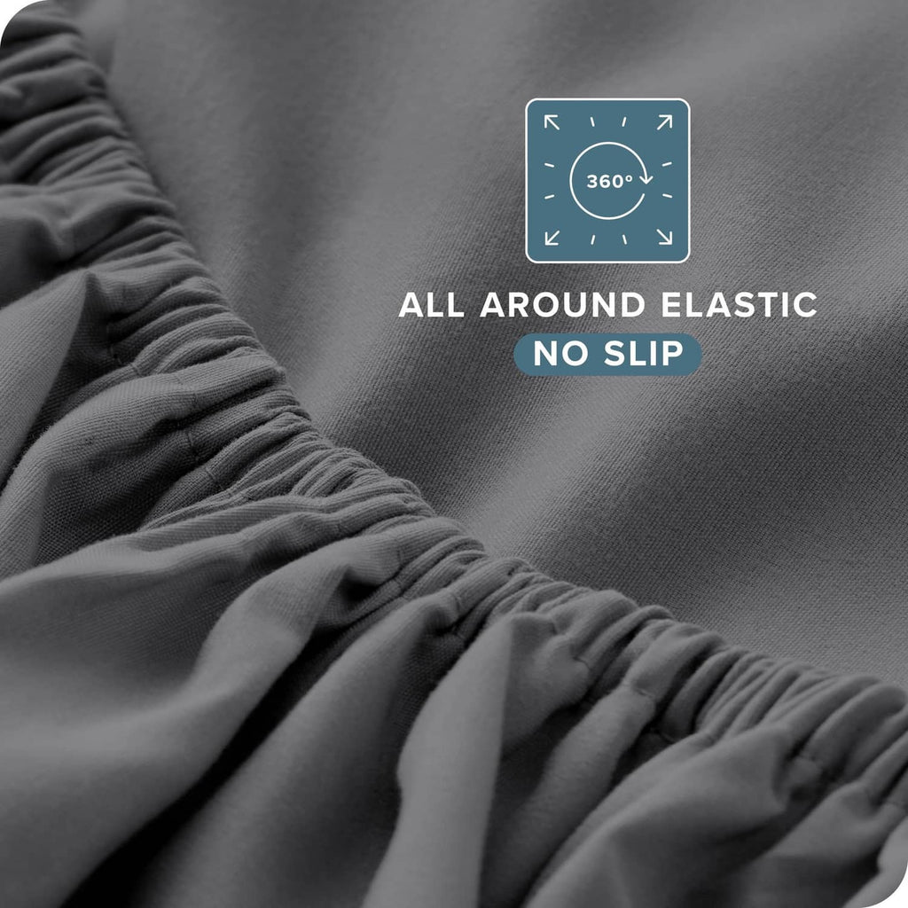 Grey fitted sheet with all-around elastic edge and no-slip grip detail
