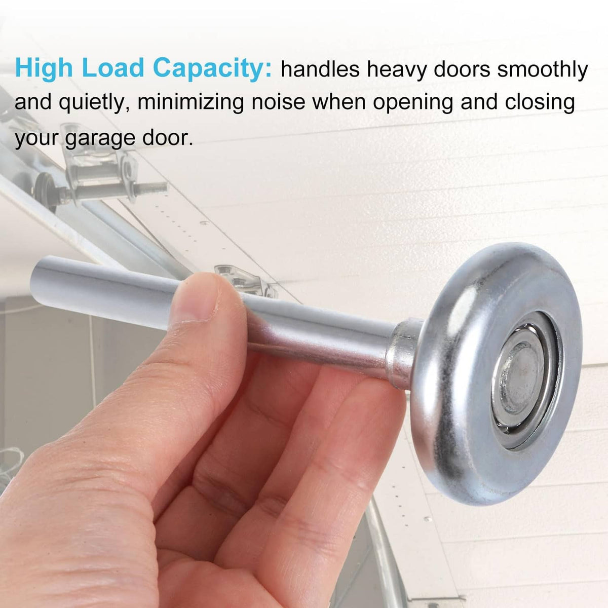 Hand holding silver garage door roller wheel with long stem