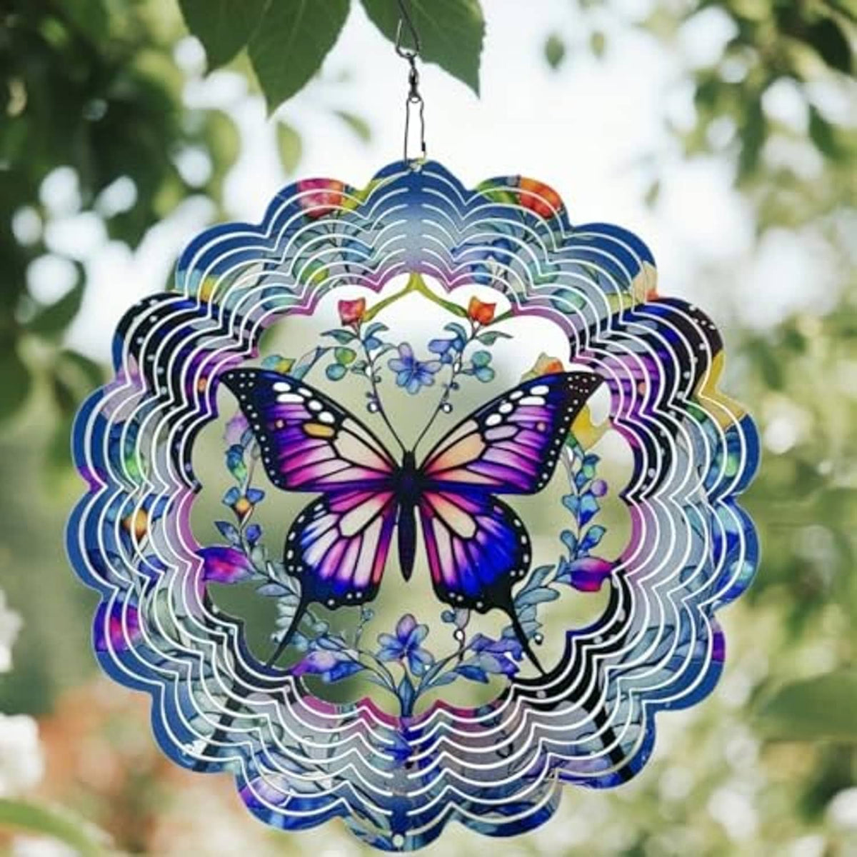 Butterfly wind spinner with multicolor scalloped metal rings and hanging chain.