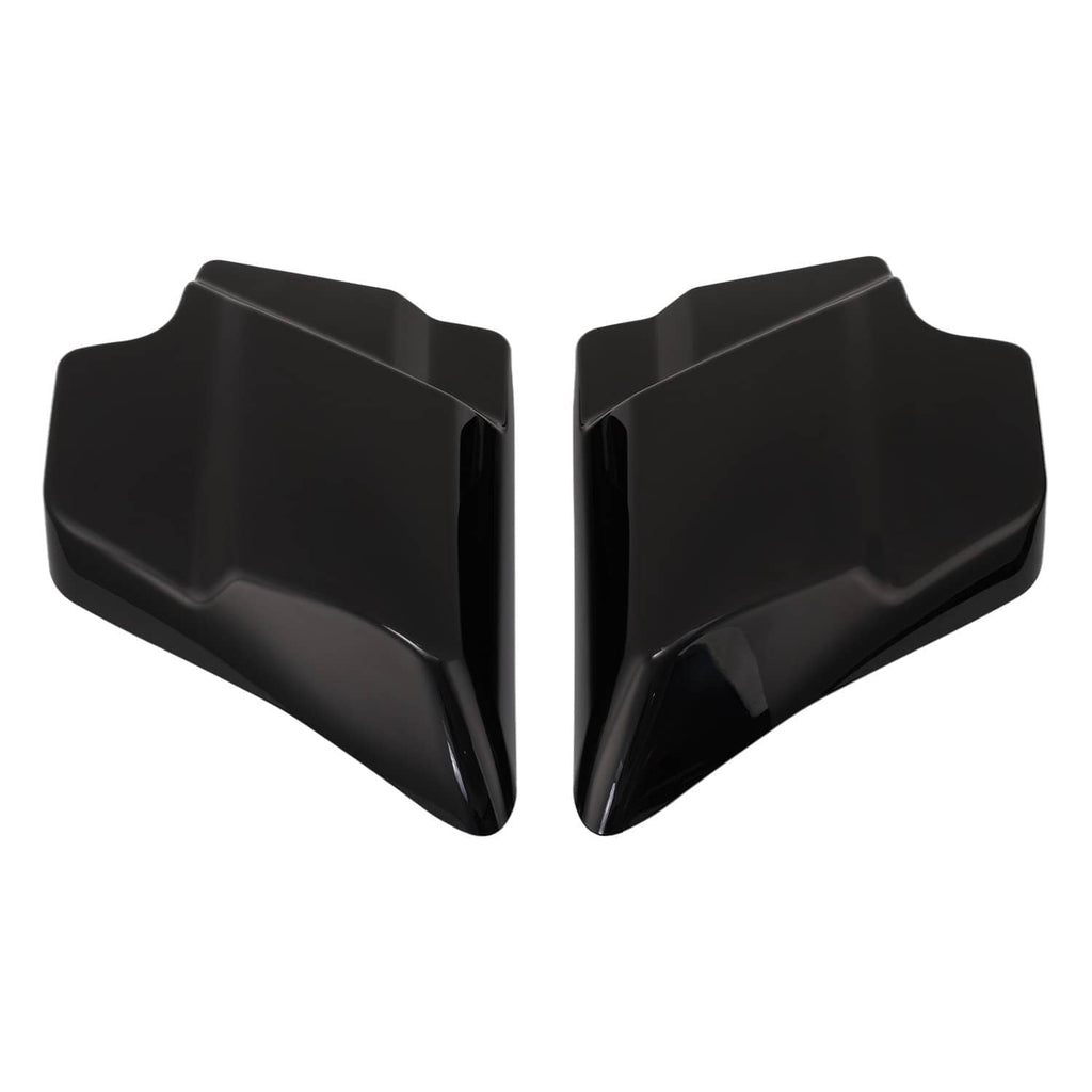 Black motorcycle side cover panels, pair viewed from the side with recessed center lines
