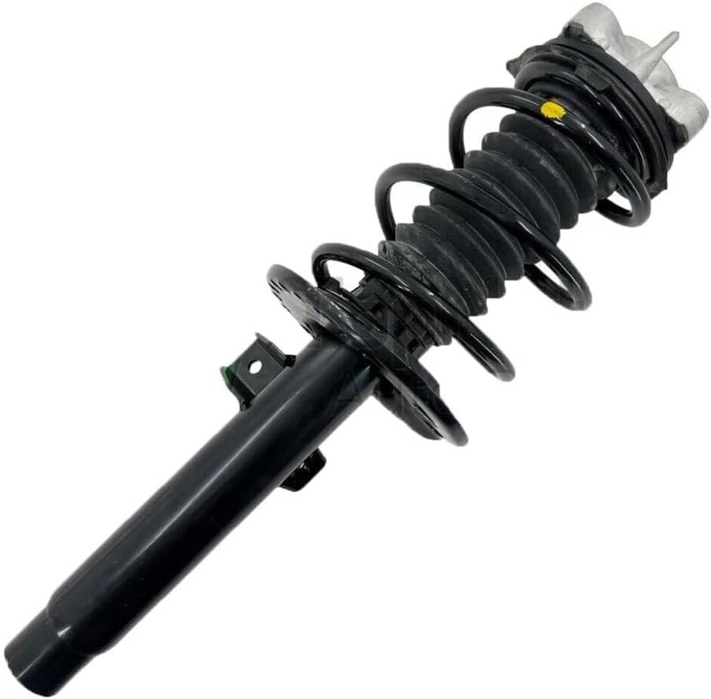 Front shock absorber strut with black coil spring and silver upper bracket.