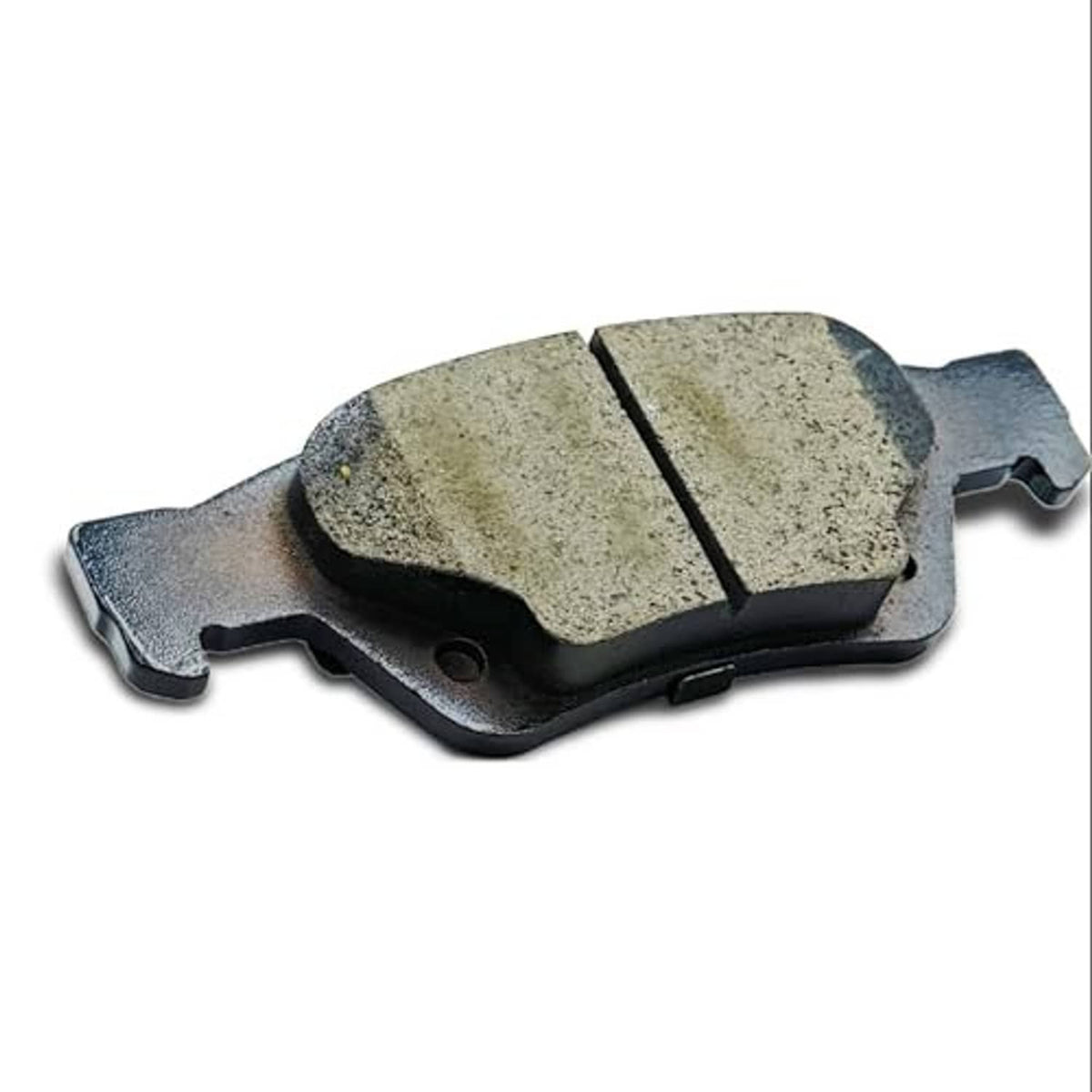 Ceramic brake pad with light gray friction surface and metal mounting tabs
