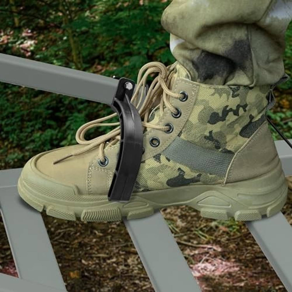 Camouflage boots on climbing stand with black stirrup strap and elastic rope hook