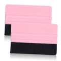 Set of 2 pink vinyl squeegee tools with black felt scraper pads