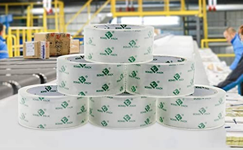 Clear packing tape refill rolls with green logo print, stacked for packing