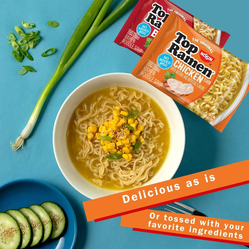 Top Ramen chicken ramen noodle soup in a bowl with a packet beside it