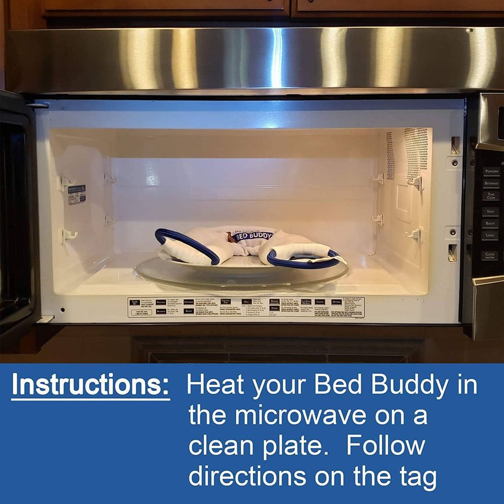 White neck wrap placed in a microwave oven to heat the pack