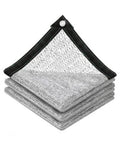 Reflective aluminet shade cloth stack, gray mesh with black border and metal grommets