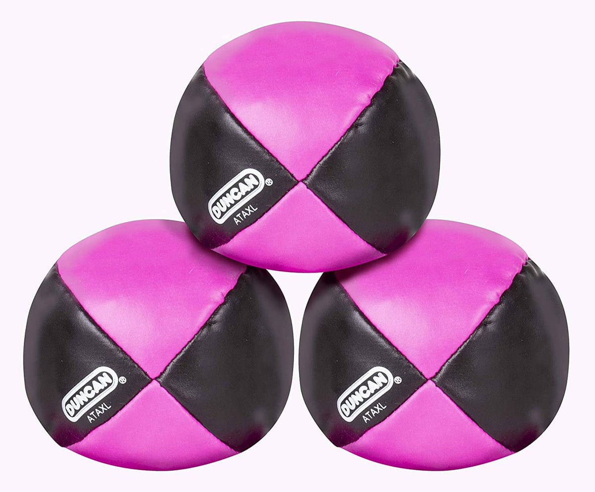 Three multicolor vinyl juggling balls on a light background, pink and black four-panel vinyl shells.